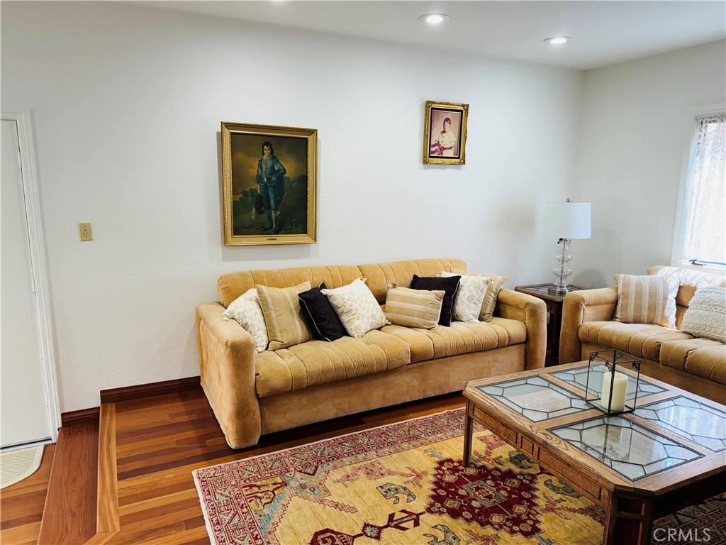 87 Rivo Alto Canal Long Beach, CA 90803 - Photo 15 of 34 a living room with furniture and wooden floor