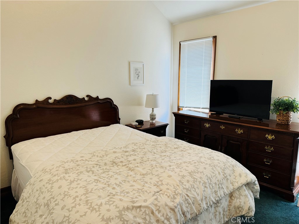 87 Rivo Alto Canal Long Beach, CA 90803 - Photo 19 of 34 a bedroom with a bed and a flat screen tv