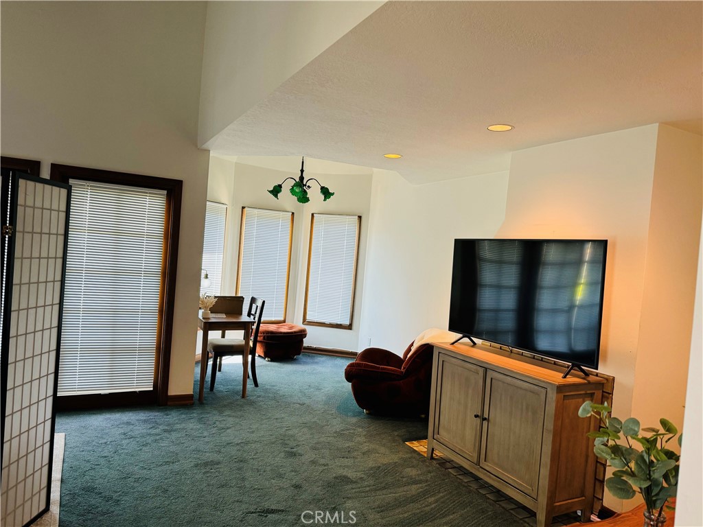 87 Rivo Alto Canal Long Beach, CA 90803 - Photo 22 of 34 a living room with furniture and a flat screen tv