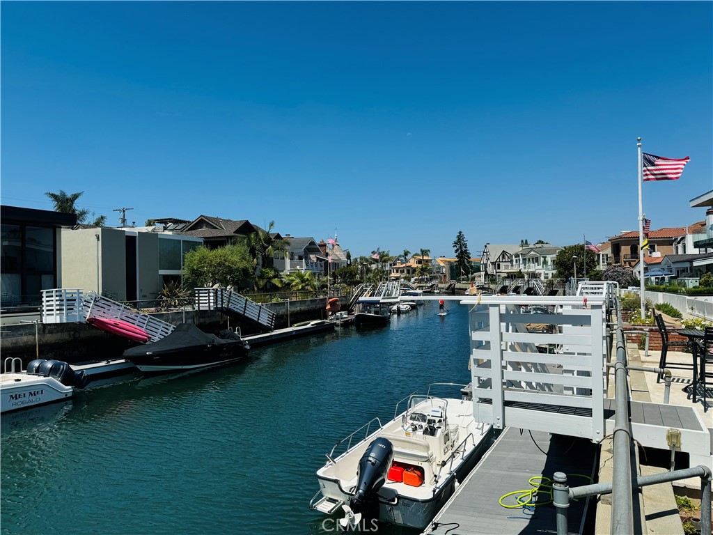 87 Rivo Alto Canal Long Beach, CA 90803 - Photo 33 of 34 a view of a lake with a car parked
