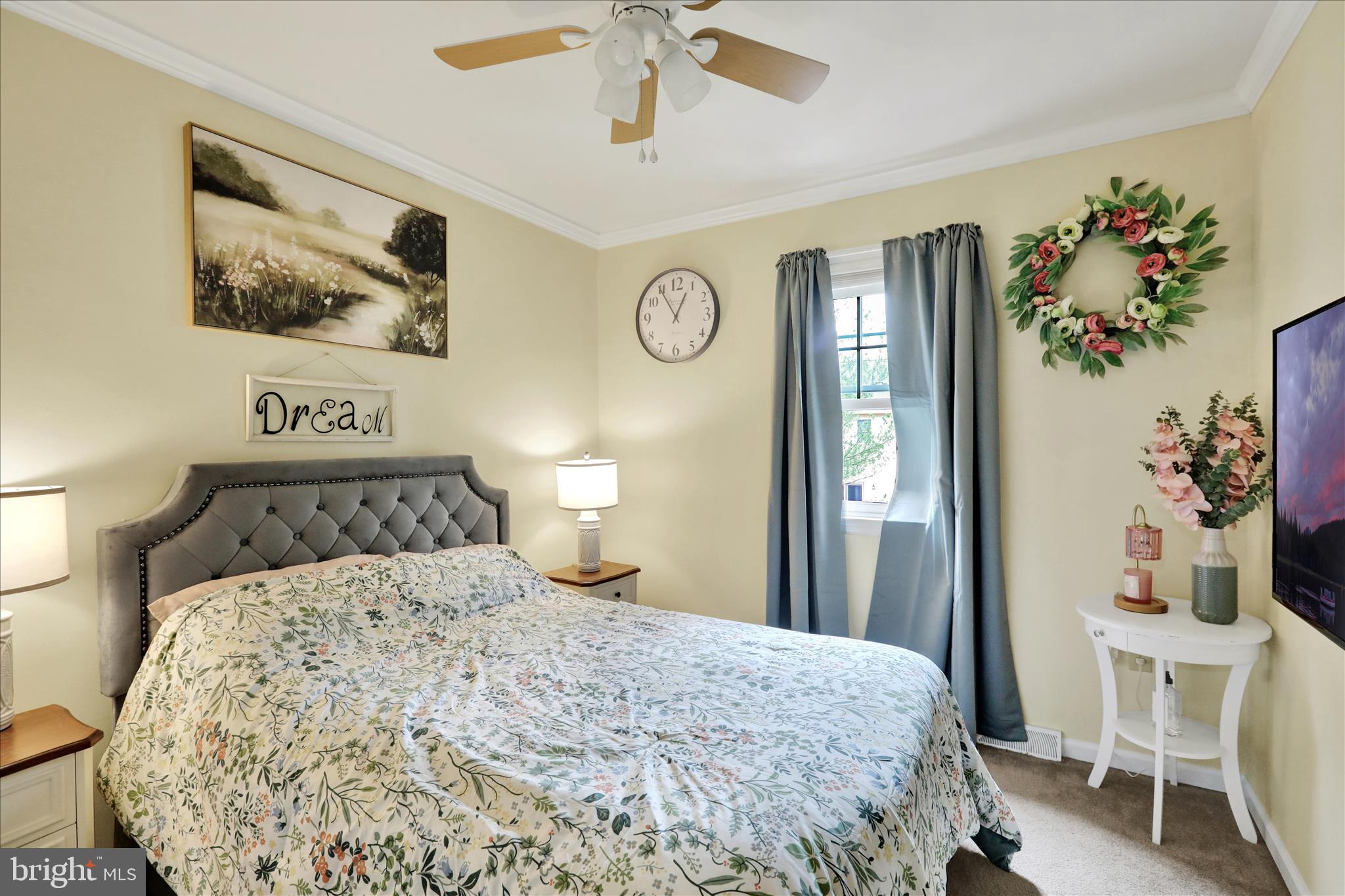 59 Winchester Court Reading, PA 19606 - Photo 19 of 39 a bedroom with a bed and a chandelier