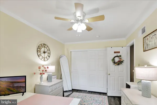 a view of a hallway with a livingroom