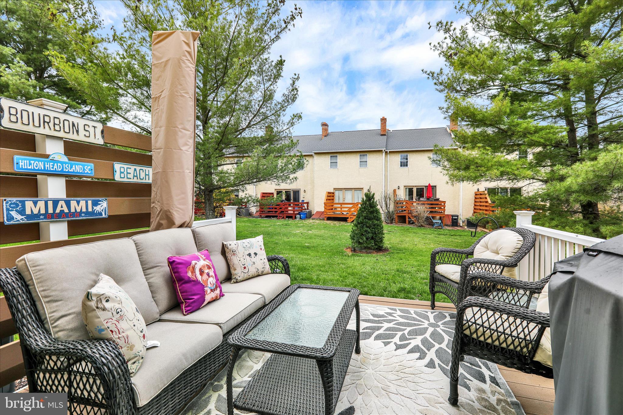 59 Winchester Court Reading, PA 19606 - Photo 29 of 39 a view of a patio with couches and a table and chairs with garden view