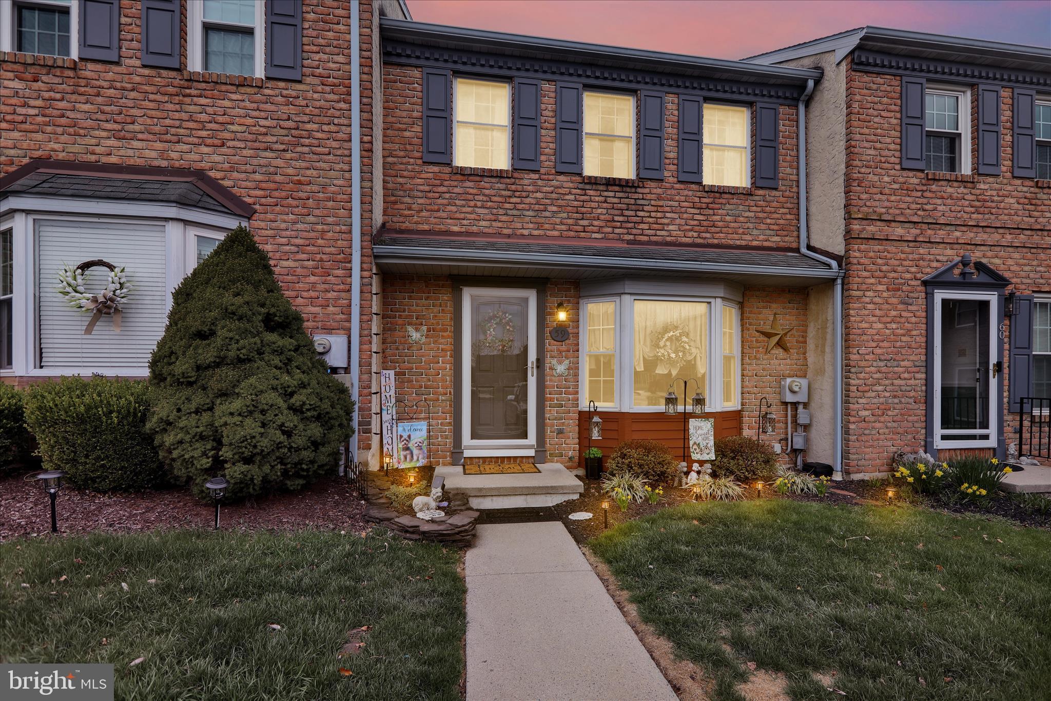 59 Winchester Court Reading, PA 19606 - Photo 35 of 39 a front view of a house with garden