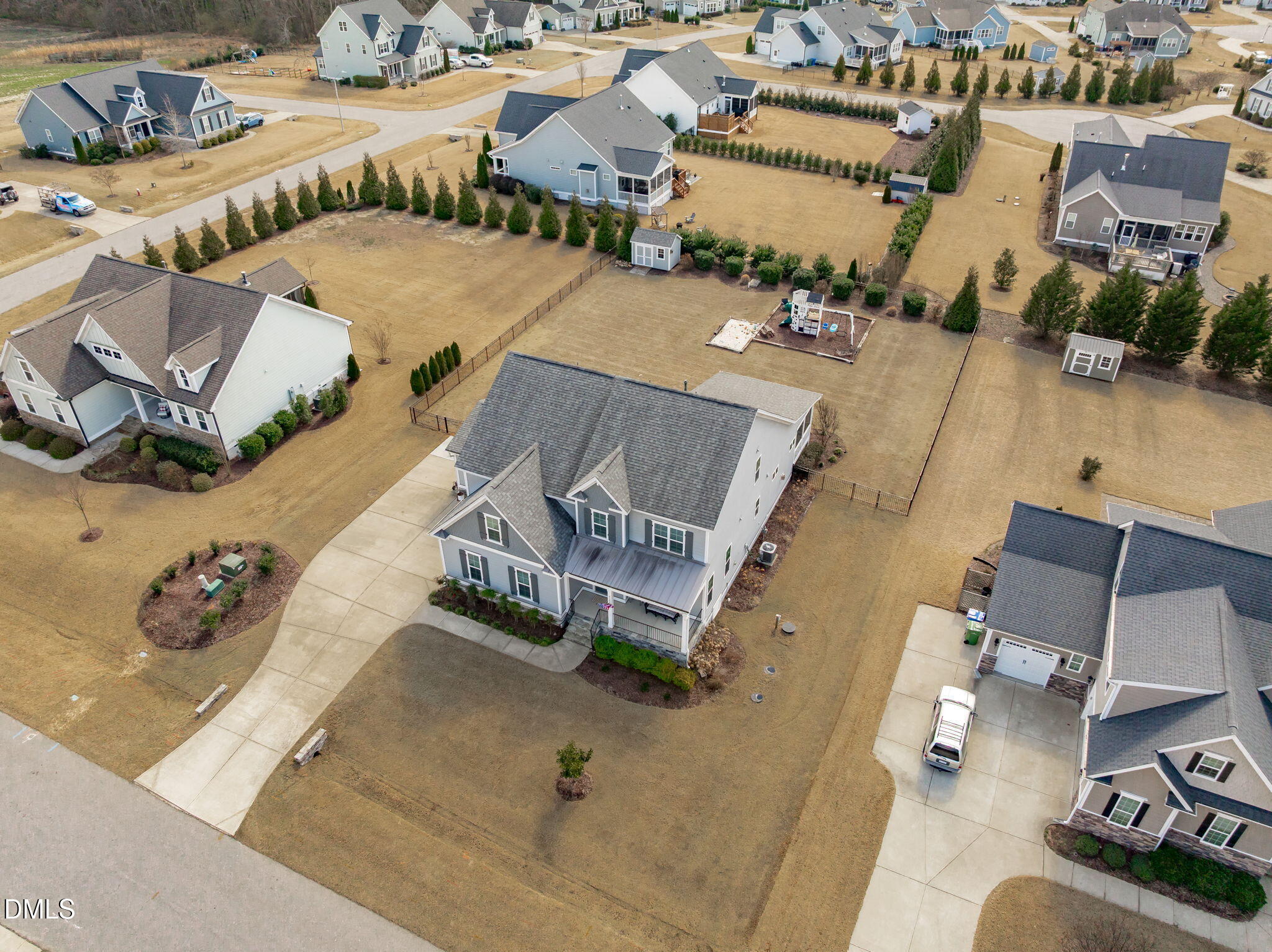 4144 Olde Judd Drive Willow Spring, NC 27592 - Photo 50 of 52 an aerial view of a house with garden space and street view