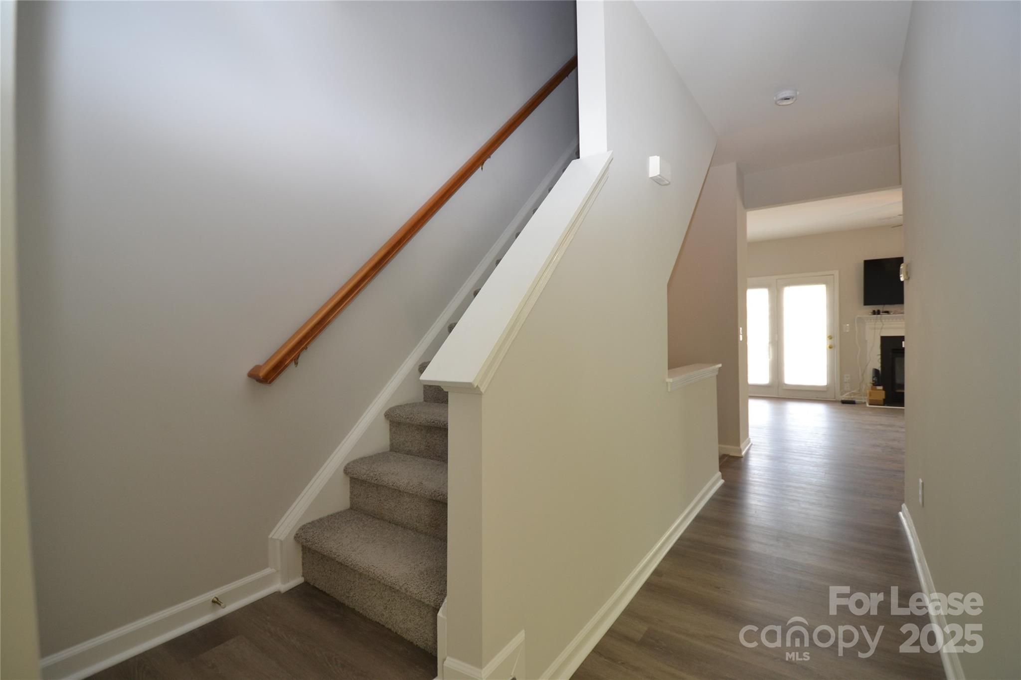 9647 Bailey Road Cornelius, NC 28031 - Photo 11 of 29 a view of entryway and hall with wooden floor