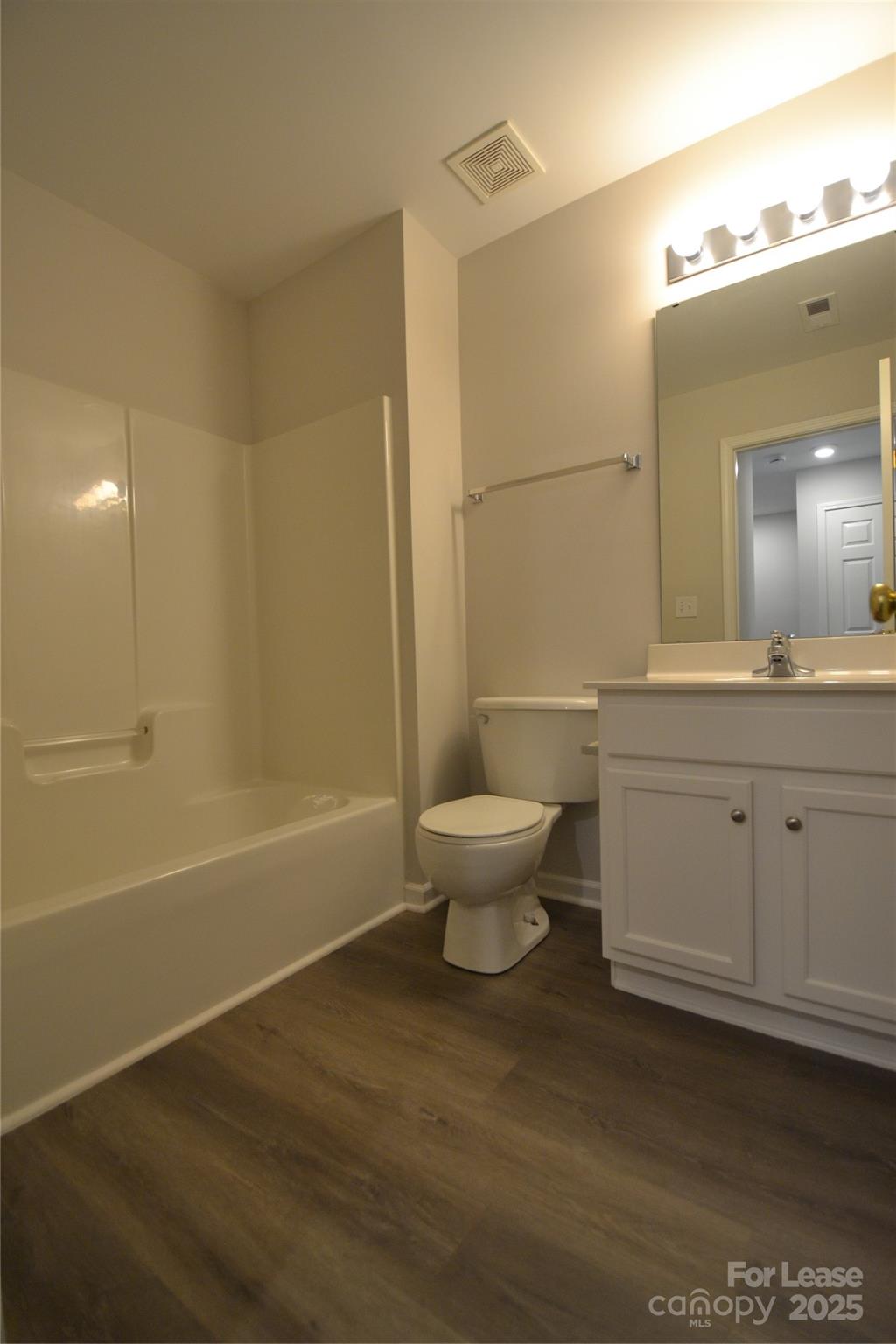9647 Bailey Road Cornelius, NC 28031 - Photo 21 of 29 a bathroom with a sink a toilet and shower