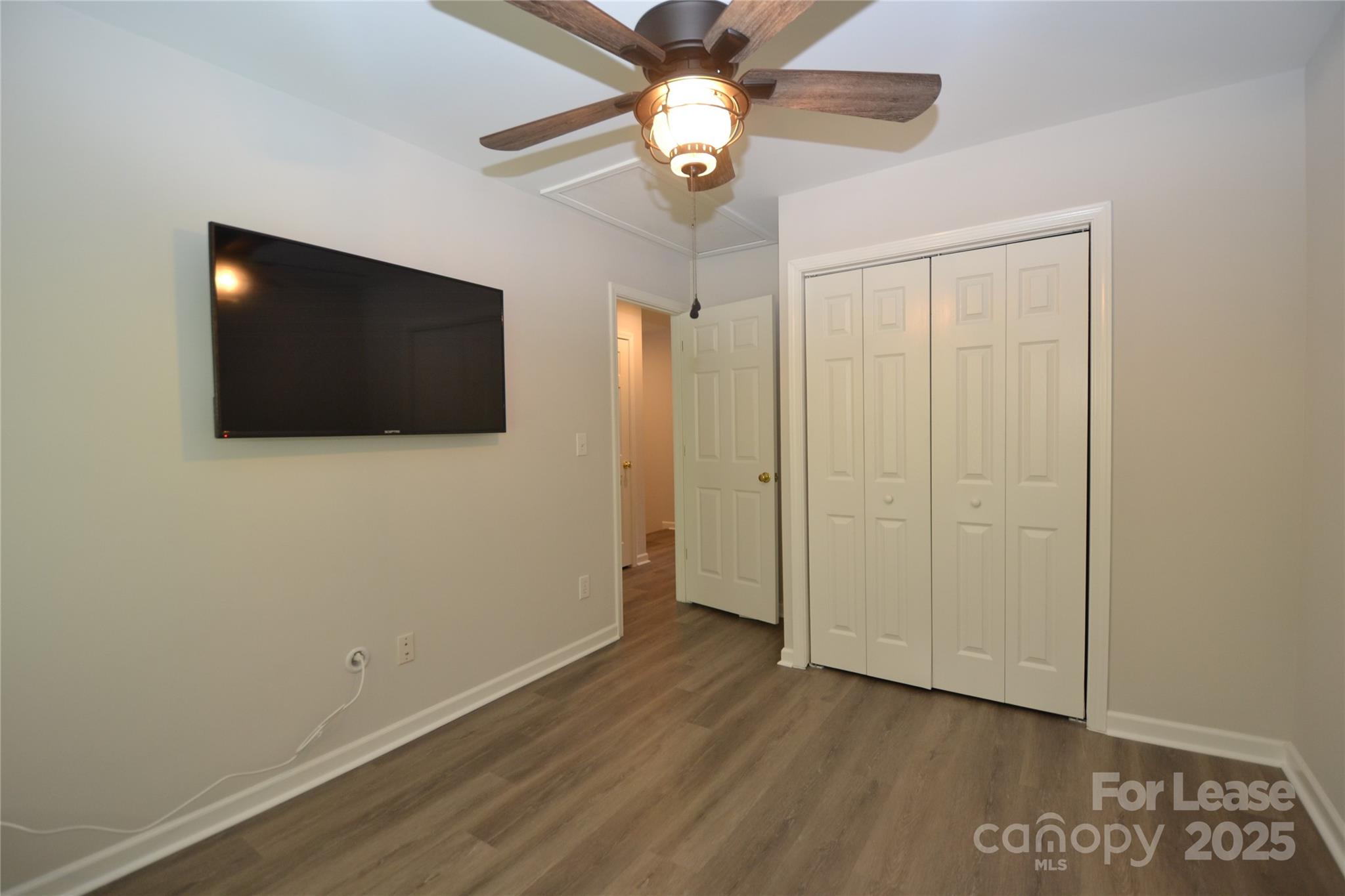 9647 Bailey Road Cornelius, NC 28031 - Photo 25 of 29 a view of a livingroom with a flat screen tv