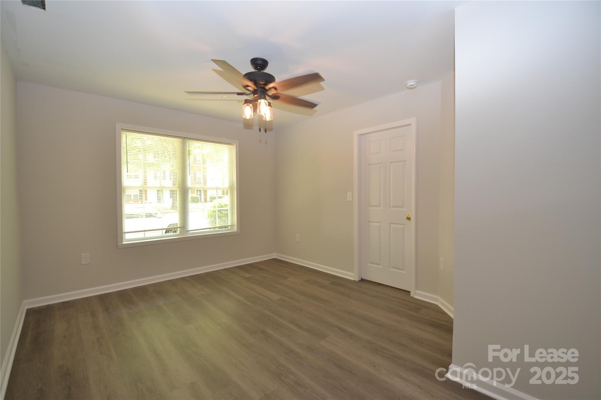 9647 Bailey Road Cornelius, NC 28031 - Photo 29 of 29 a view of an empty room with a window