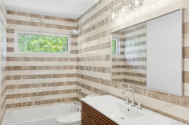 a view of outdoor space with deck and yard