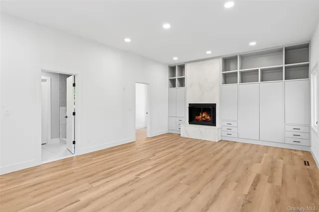 a view of a hallway with washer and dryer