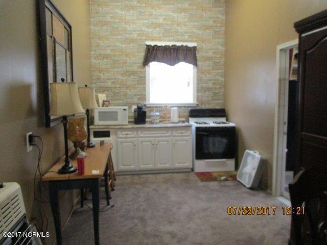 4529 Virginia Road Wilson, NC 27893 - Photo 23 of 28 Small Kitchen area in the he/she cave. Detached Garage Interior.