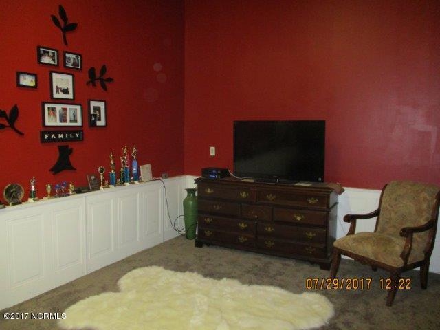 4529 Virginia Road Wilson, NC 27893 - Photo 24 of 28 Entertaining area in the he/she cave. Detached Garage Interior.