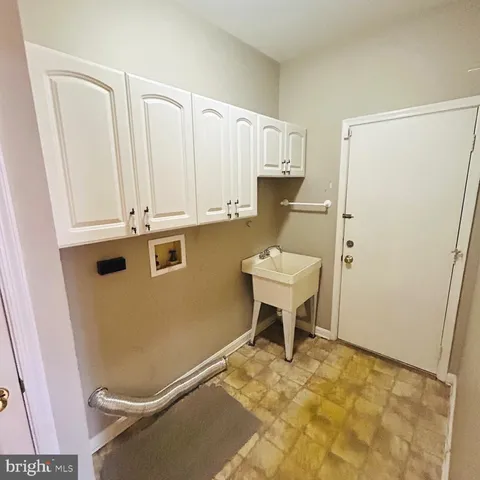 a view of a room with table and chair