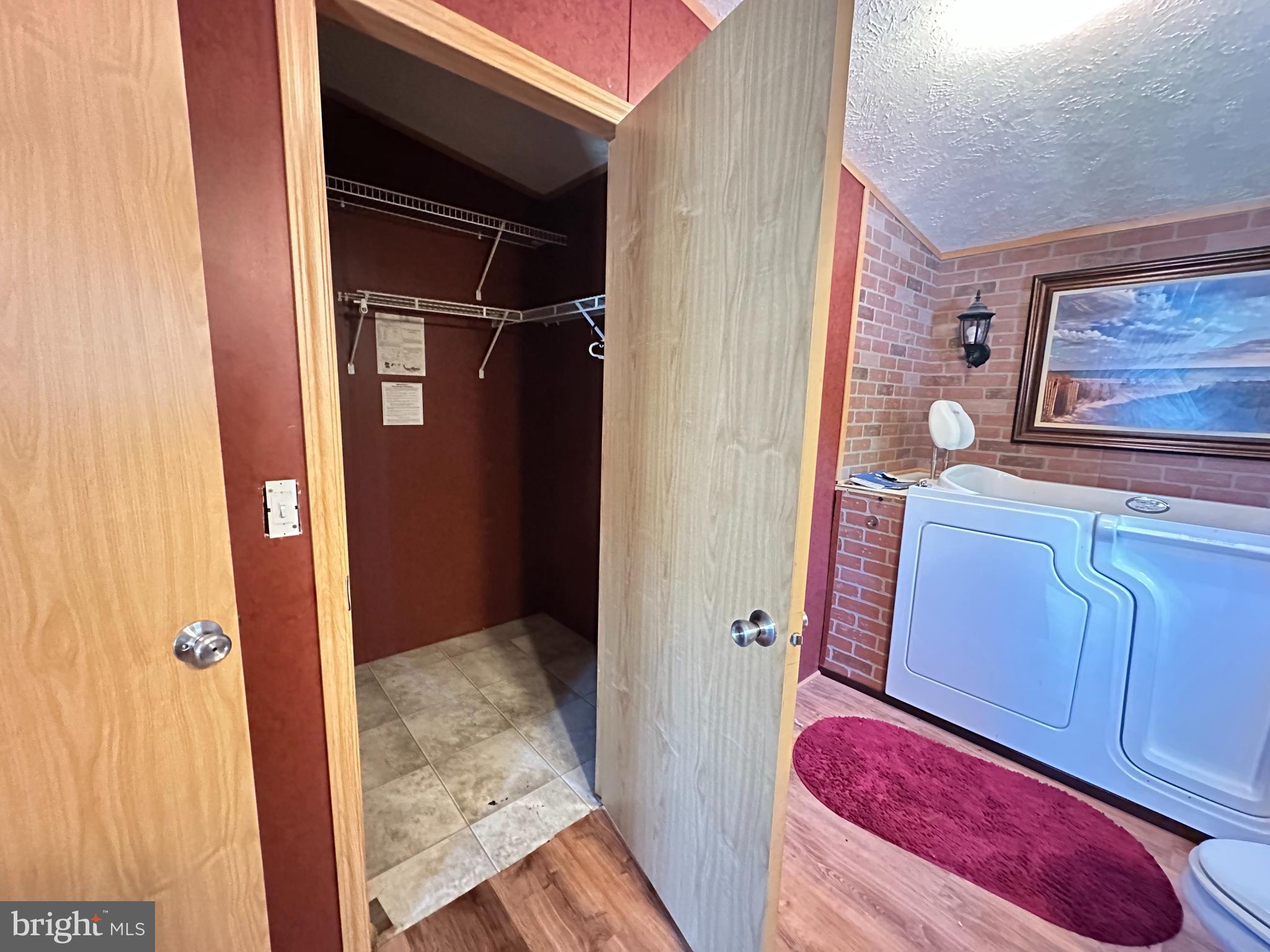 35390 Heron Road Millsboro, DE 19966 - Photo 10 of 25 a view of walk in closet