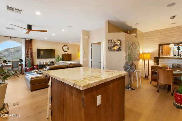 a view of a living room and dining room
