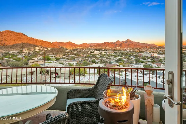 a view of a chairs in balcony