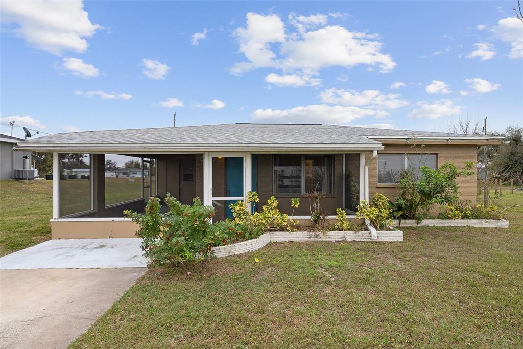 30087 Alder Road Punta Gorda, FL 33982 - Photo 1 of 1 a house view with sitting space and garden space