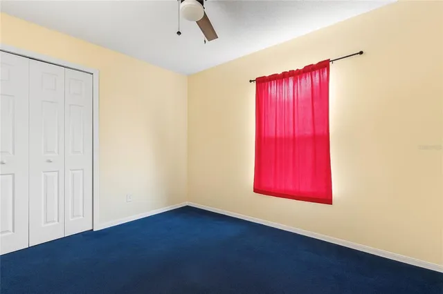 a bathroom with a sink vanity and toilet