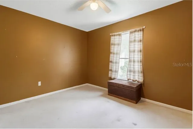 a view of a house with a swimming pool