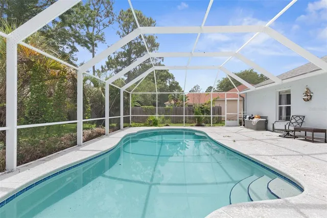 a view of a house with a swimming pool