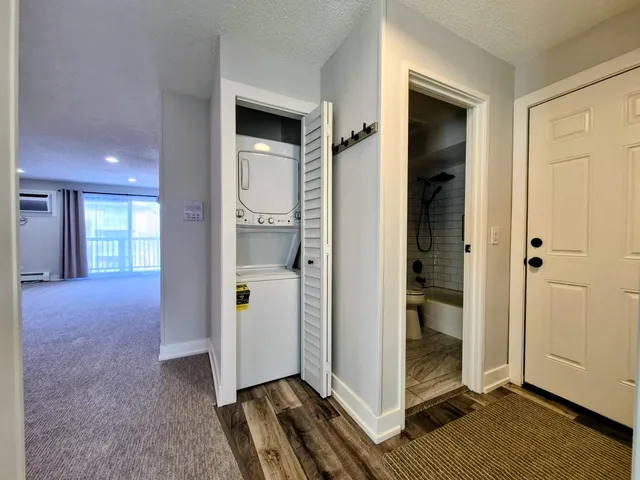a view of room with a ceiling fan