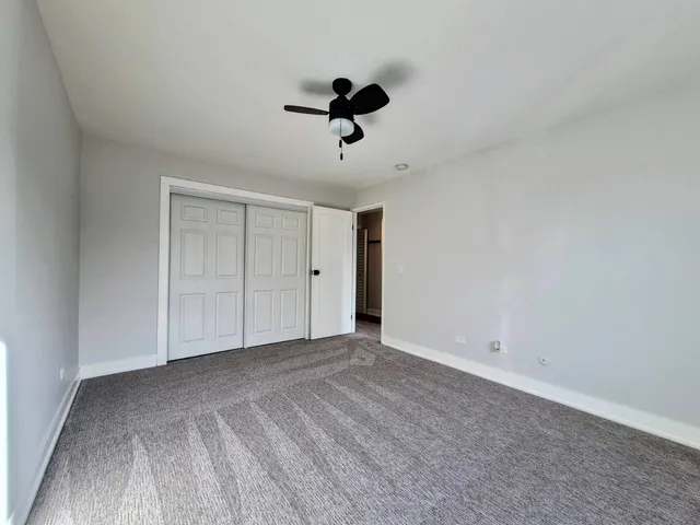 a view of balcony with wooden floor
