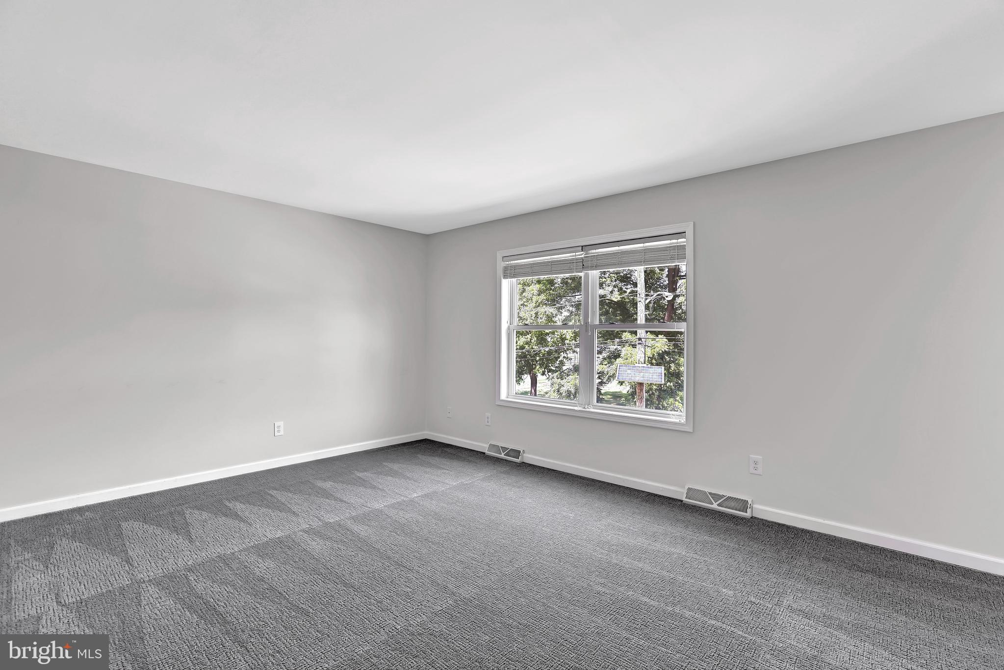 515 Ridge Avenue Hamilton, NJ 08610 - Photo 19 of 30 an empty room with a window