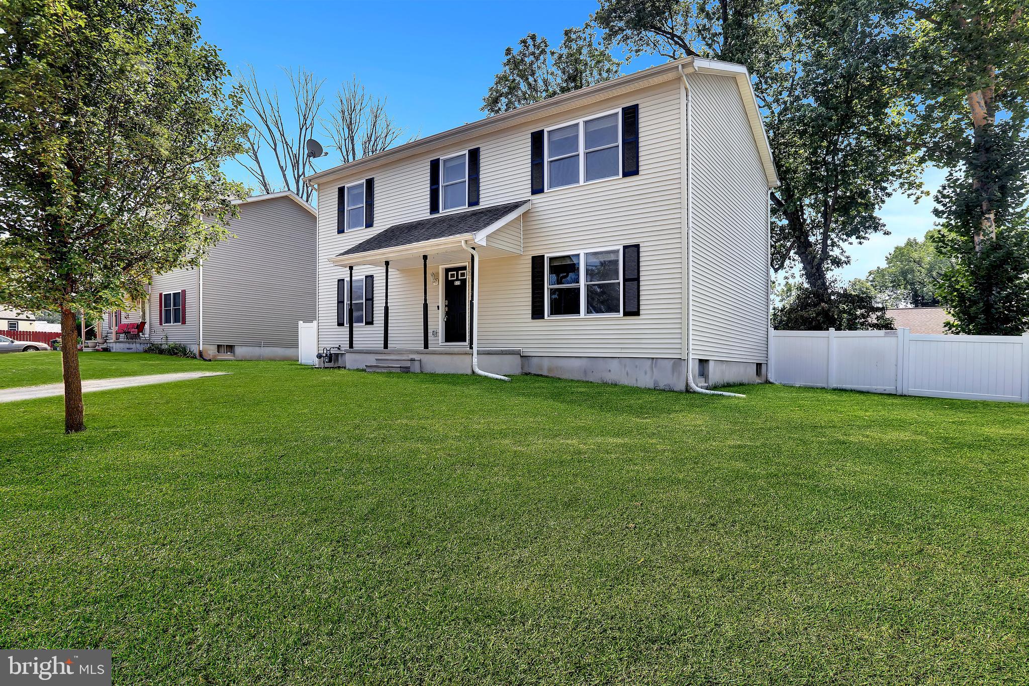 515 Ridge Avenue Hamilton, NJ 08610 - Photo 2 of 30 a front view of house with yard and green space