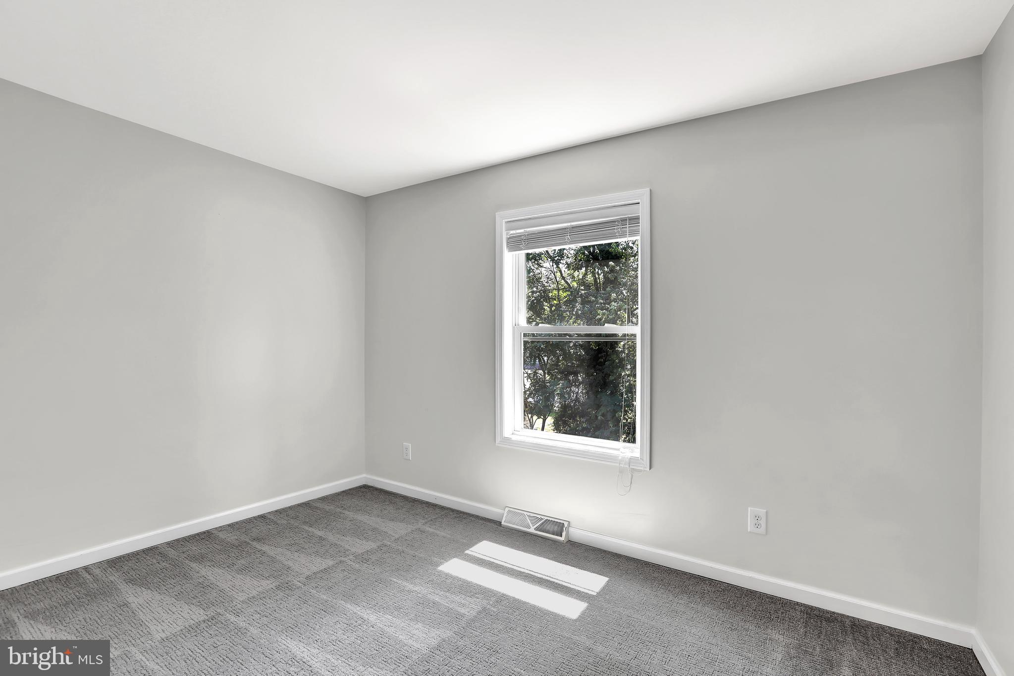 515 Ridge Avenue Hamilton, NJ 08610 - Photo 22 of 30 an empty room with a window