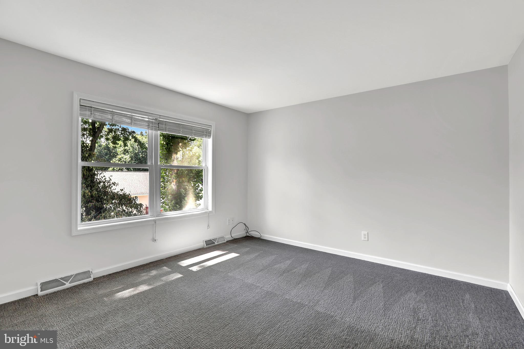 515 Ridge Avenue Hamilton, NJ 08610 - Photo 26 of 30 an empty room with a window