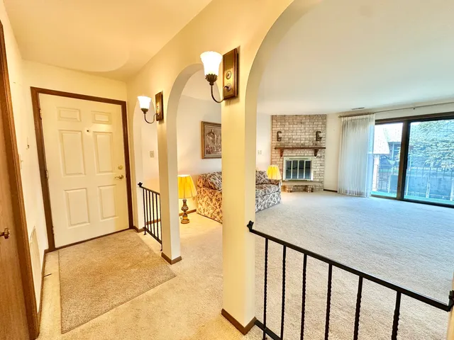 a view of livingroom with furniture and a window