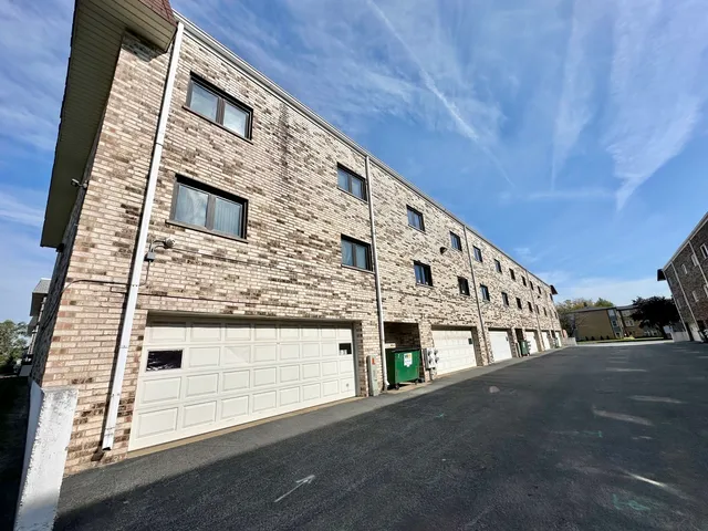 a view of a house with a street