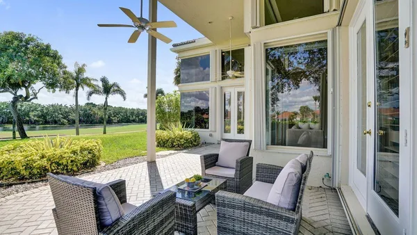 a view of a house with a big yard