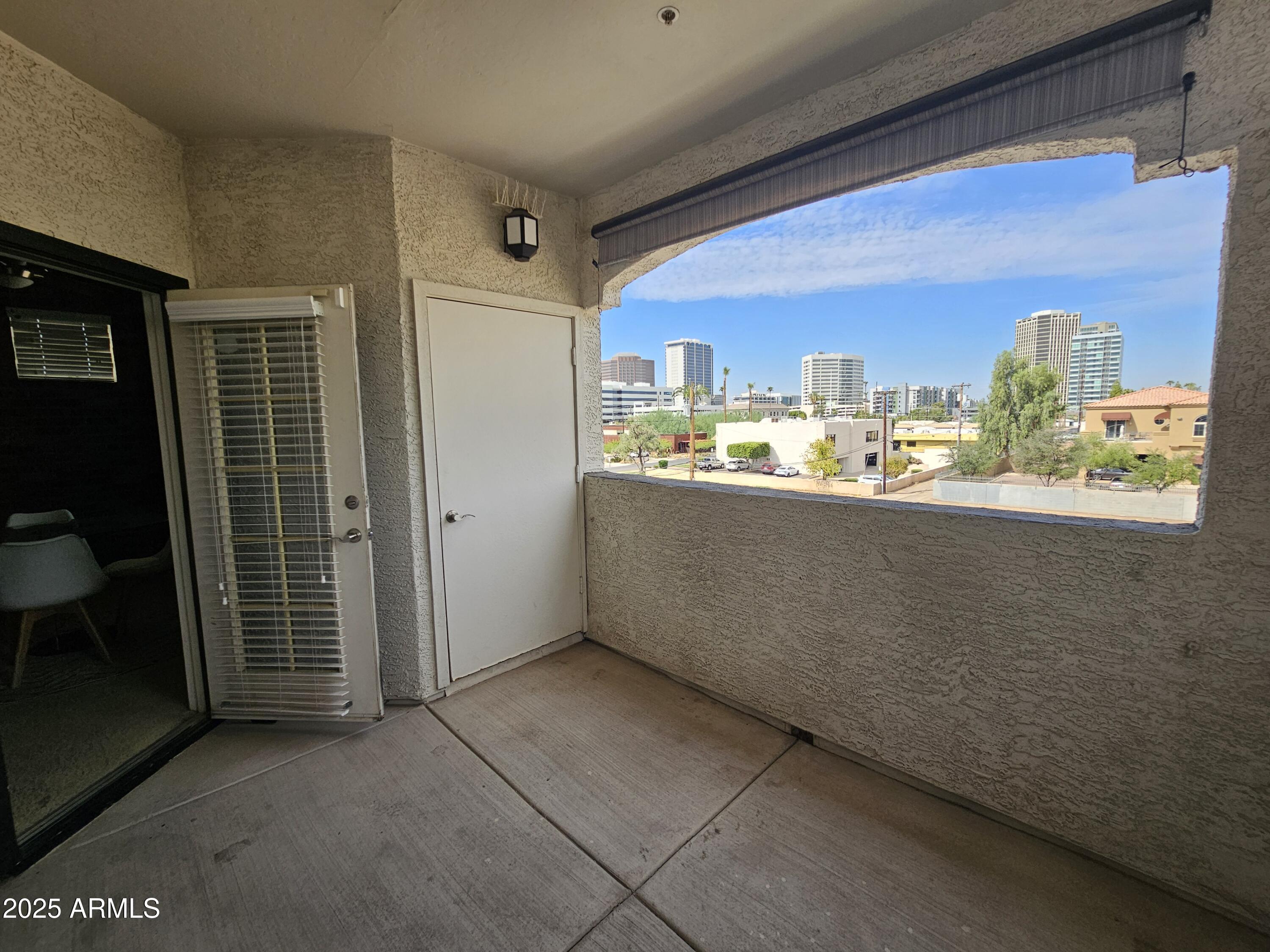 3302 North 7th Street, Unit 332 Phoenix, AZ 85014 - Photo 24 of 33 a kitchen with stainless steel appliances a sink and window
