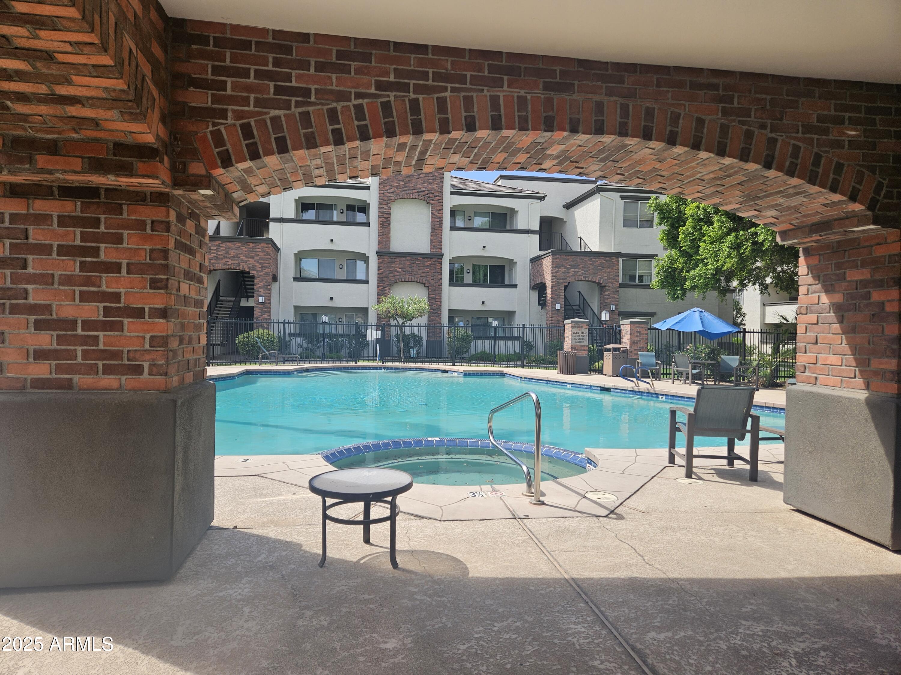 3302 North 7th Street, Unit 332 Phoenix, AZ 85014 - Photo 26 of 33 a garden view with a seating space
