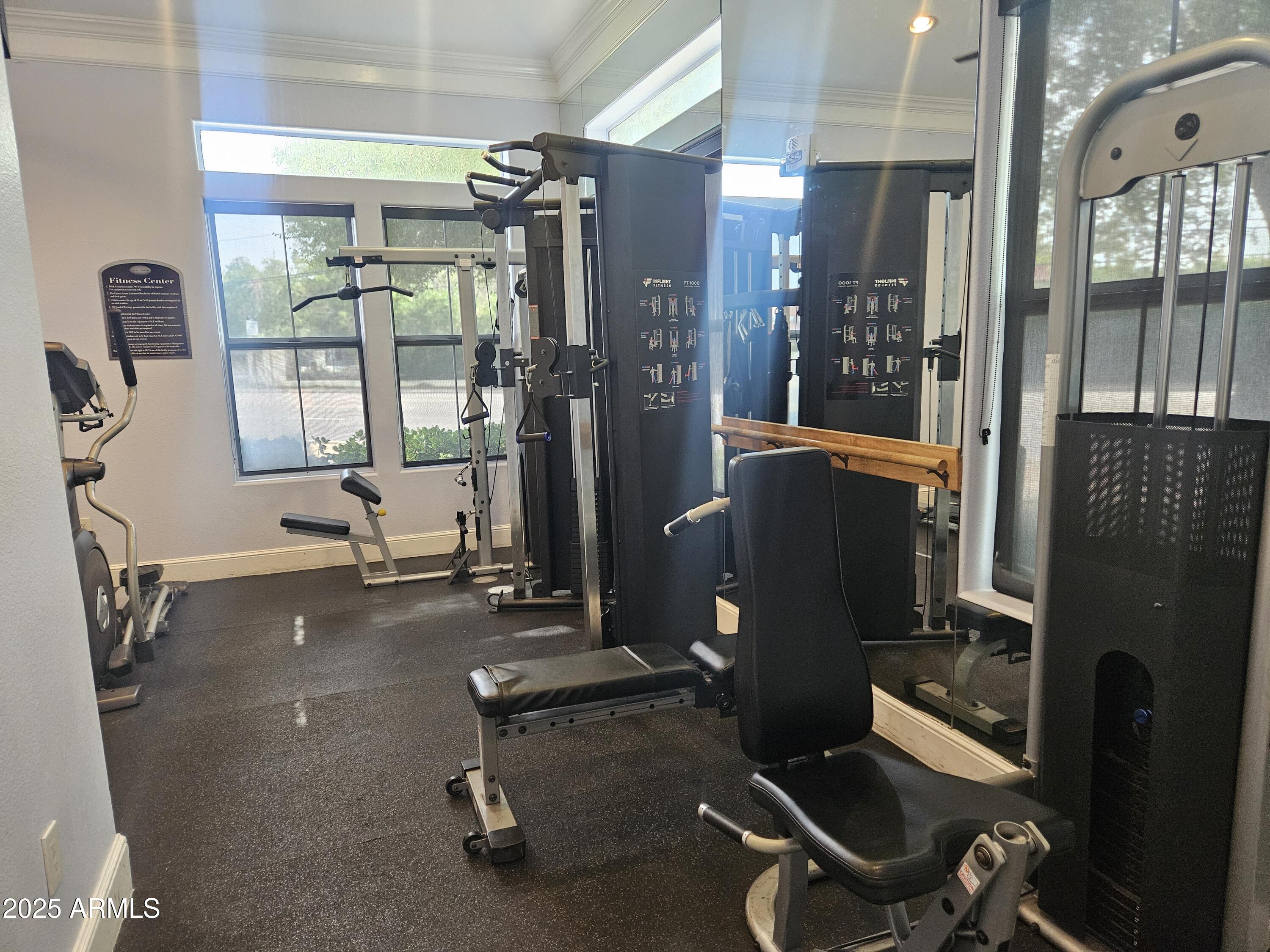 3302 North 7th Street, Unit 332 Phoenix, AZ 85014 - Photo 28 of 33 a room with gym equipment