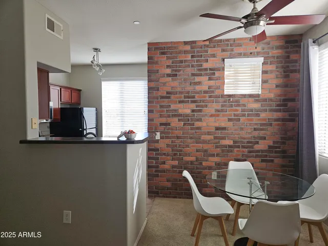 a dining room with furniture