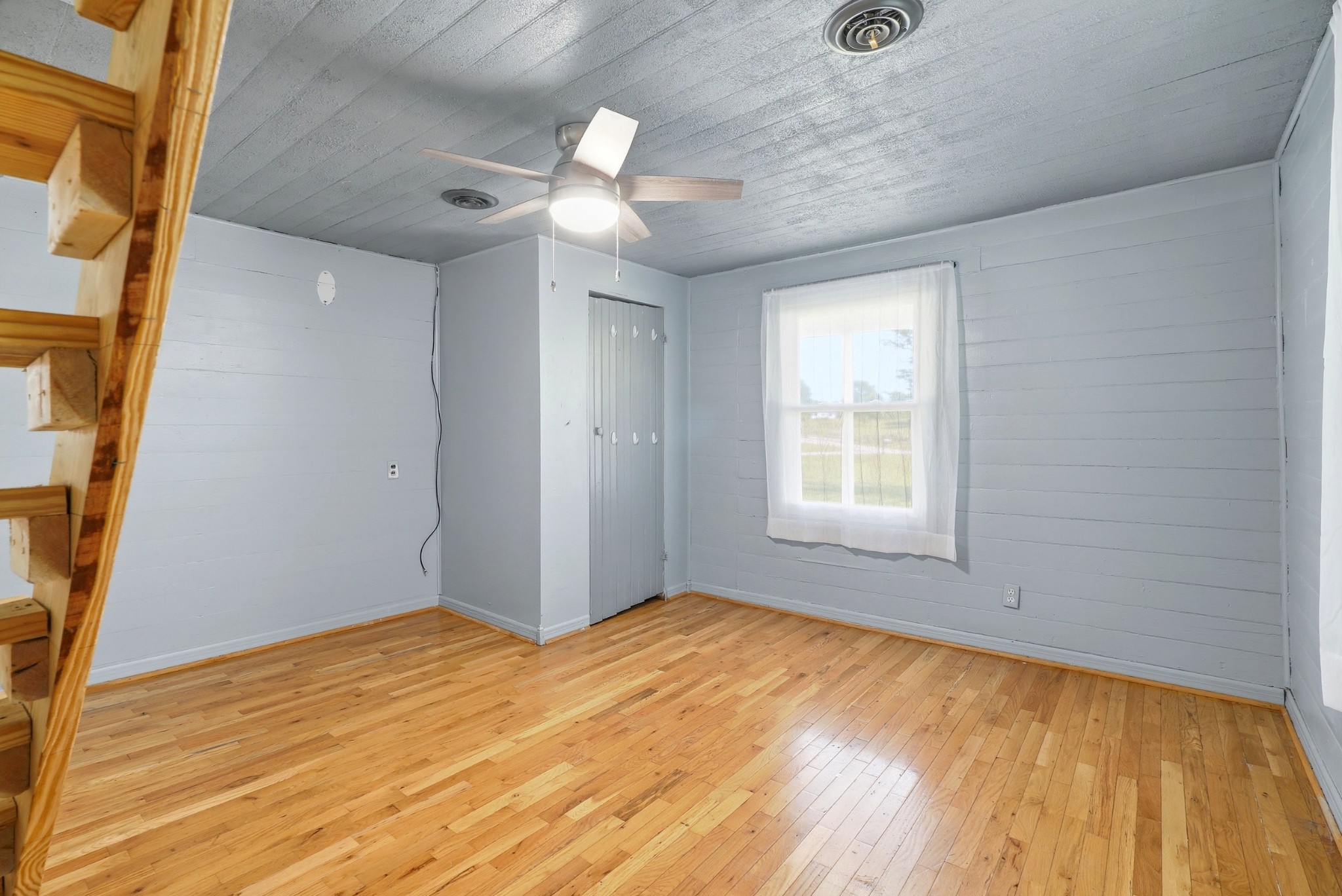 6471 Highway 161 Springfield, TN 37172 - Photo 37 of 57 a view of empty room with wooden floor and fan