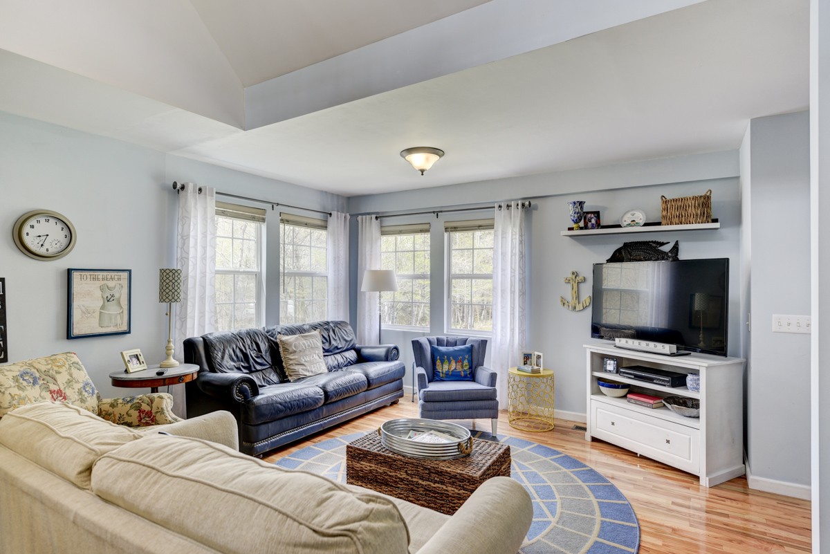 8565 South Tatum Creek Road Lyles, TN 37098 - Photo 22 of 31 a living room with furniture and a flat screen tv