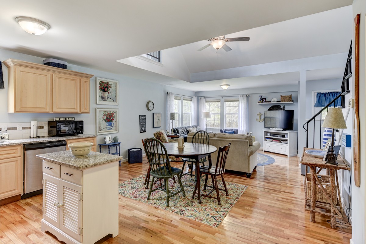 8565 South Tatum Creek Road Lyles, TN 37098 - Photo 27 of 31 a view of a dining room with furniture and wooden floor