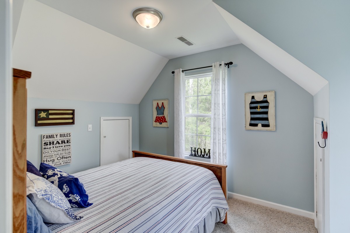 8565 South Tatum Creek Road Lyles, TN 37098 - Photo 28 of 31 a bedroom with a bed and a window