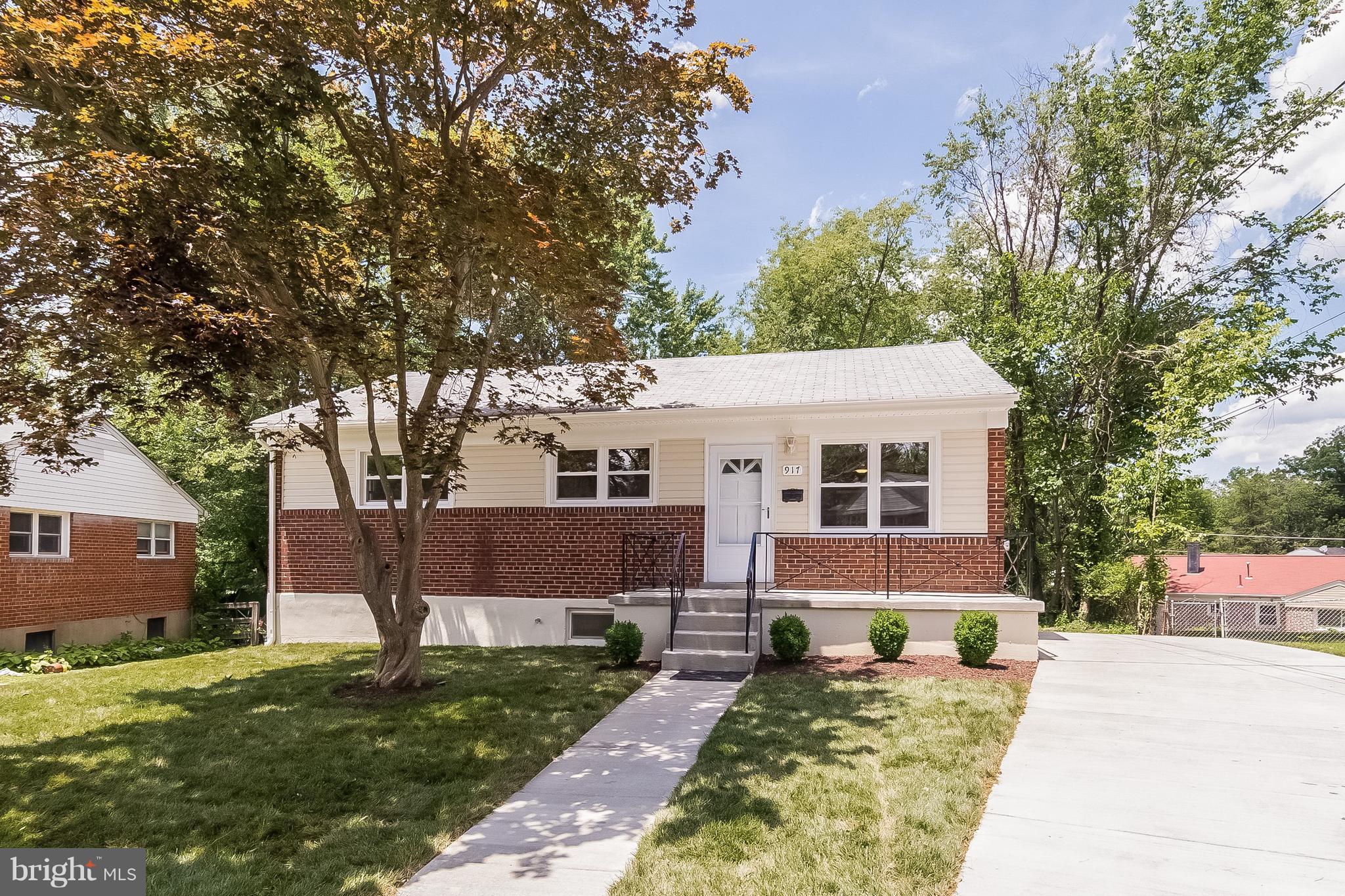 917 Benson Terrace Silver Spring, MD 20901 - Photo 1 of 25 a front view of a house with a yard