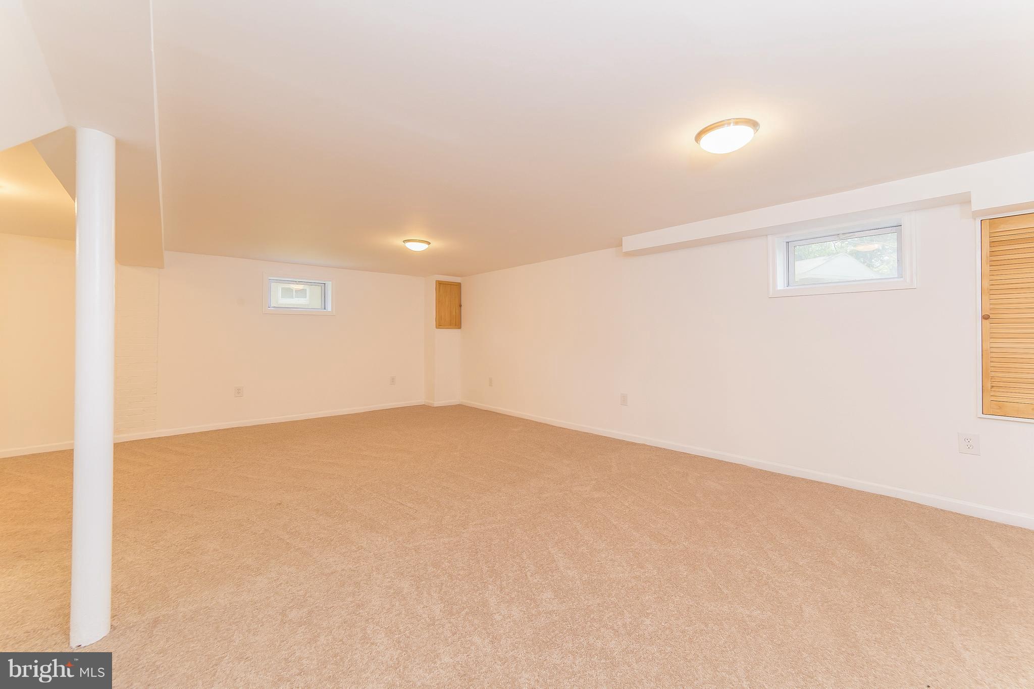 917 Benson Terrace Silver Spring, MD 20901 - Photo 16 of 25 a view of an empty room with a window