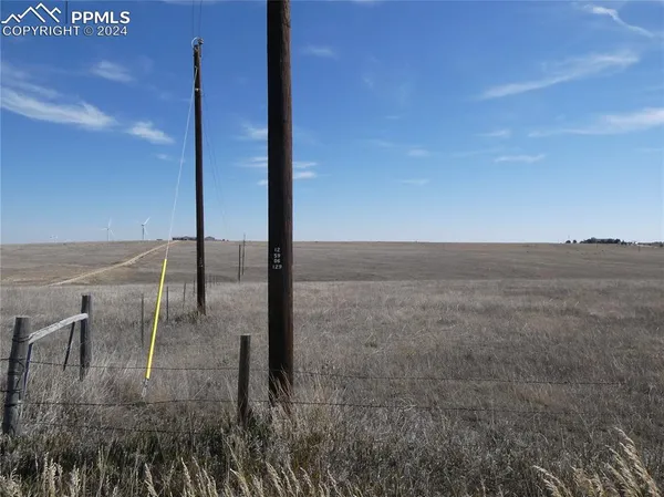 a view of outdoor space with wooden floor