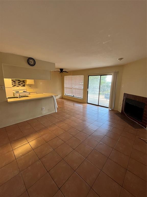 4460 Chaha Road, Unit 205 Garland, TX 75043 - Photo 4 of 27 a view of an empty room and window