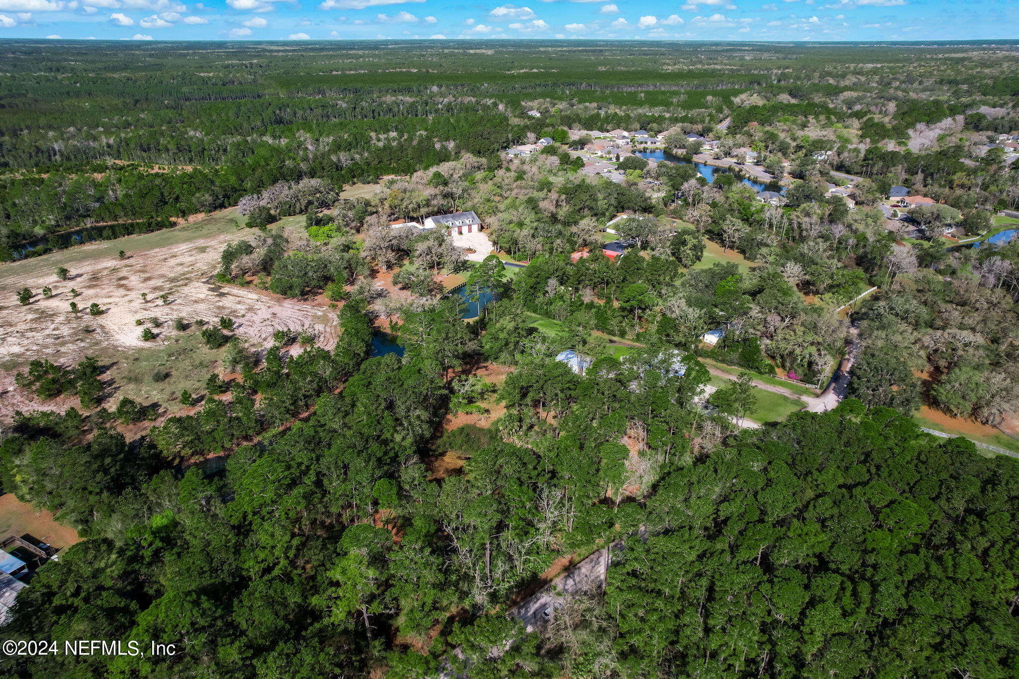 87273 Raddin Road Yulee, FL 32097 - Photo 11 of 14 a view of a field with an ocean view