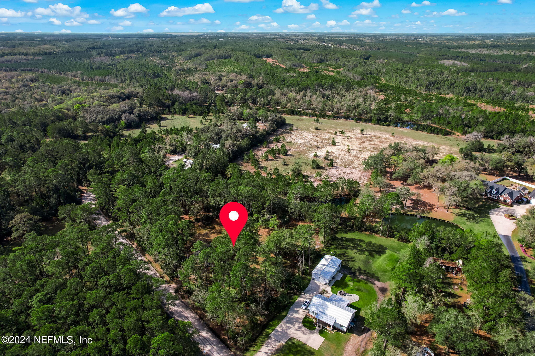 87273 Raddin Road Yulee, FL 32097 - Photo 12 of 14 a view of a outdoor space and mountain view