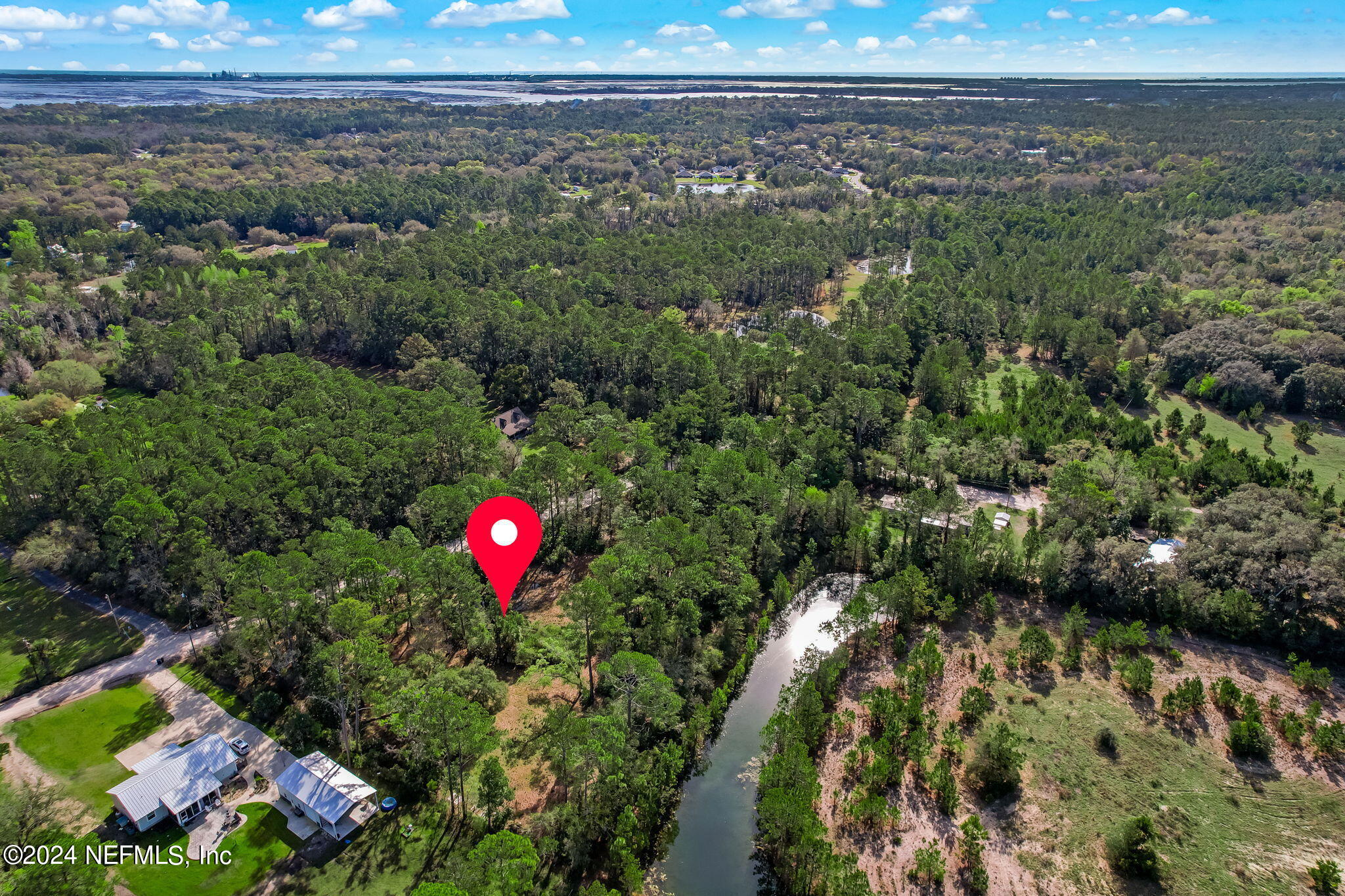 87273 Raddin Road Yulee, FL 32097 - Photo 4 of 14 a view of a yard