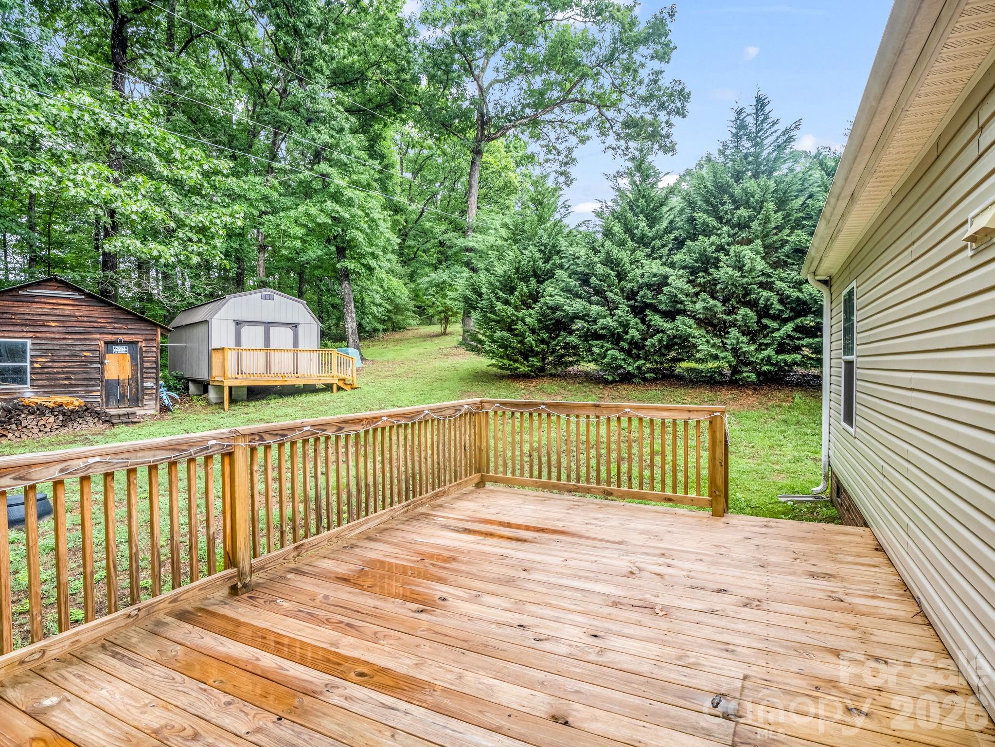 1449 Toney Road Bostic, NC 28018 - Photo 12 of 43 a view of a wooden deck